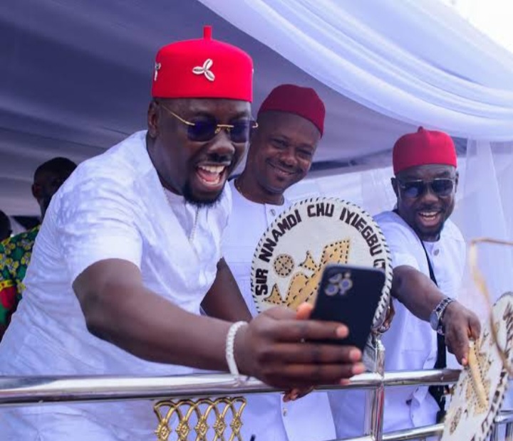 Obi Cubana with brothers during mother’s burial in Oba