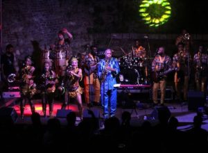 Femi Kuti and his band performing on stage