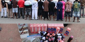 EFCC operatives arresting suspects in Lagos raid