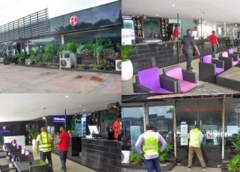 LASEPA officials sealing the front gate of a bar or lounge in Lekki, Lagos.