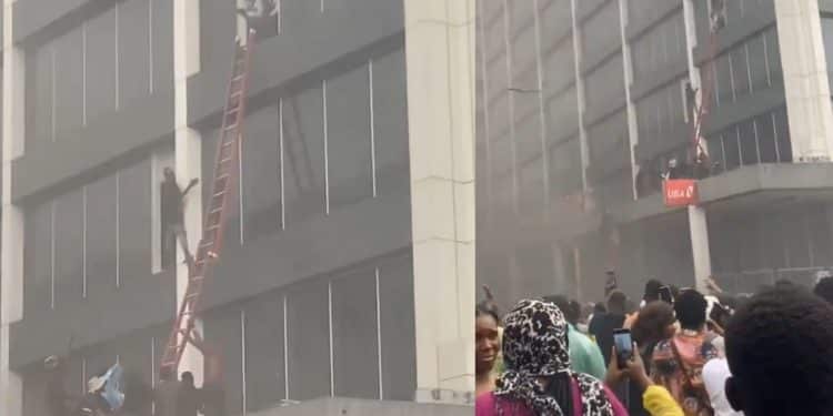 A UBA bank branch on Lagos Island with smoke rising from it.