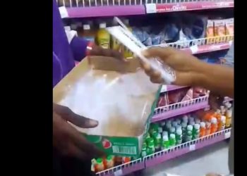 Lagos enforcement team seizing plastic straws and red cups at supermarket