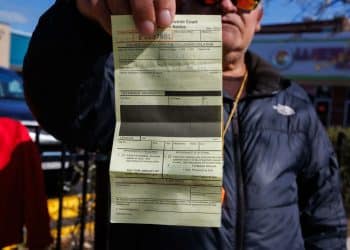 Image of a $130 citation/ticket issued by ICE agents to a legal resident in Chicago for not carrying proof of registration.