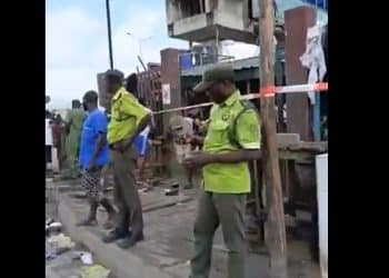 picture of the market entrance with a visible government seal/lock