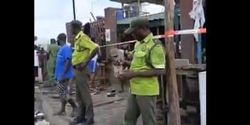 picture of the market entrance with a visible government seal/lock