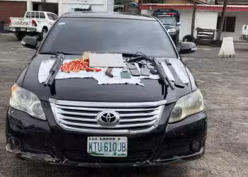 Recovered arms and ammunition, including two pump-action guns, seized from arrested Lagos cultists.