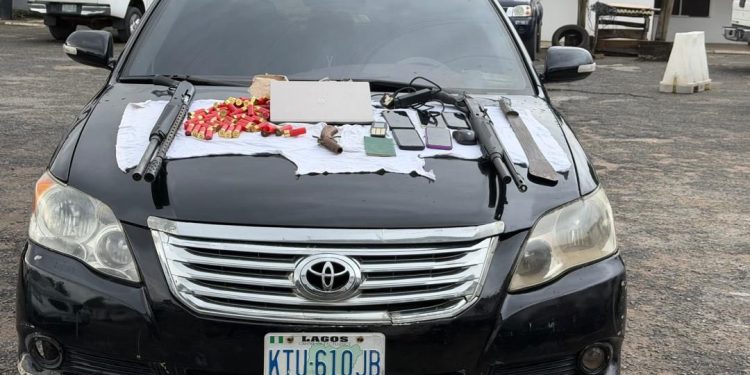 Recovered arms and ammunition, including two pump-action guns, seized from arrested Lagos cultists.