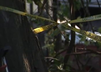 Police cordon tape on a Chicago street.