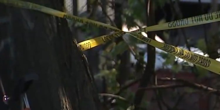 Police cordon tape on a Chicago street.
