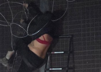 U.S. Border Patrol agents cutting concertina wire to free an individual trapped on the border.