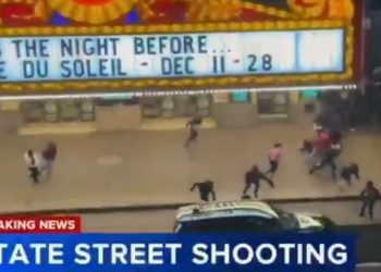 Chicago police tape near the 100 block of South Dearborn Street in the Loop after the fatal shooting of 14-year-old Armani Floyd.