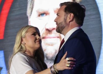 Erika Kirk hugging JD Vance at Turning Point USA event after Charlie Kirk's death