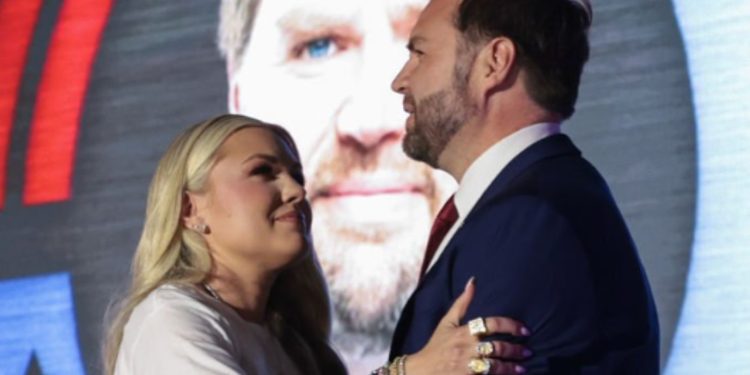 Erika Kirk hugging JD Vance at Turning Point USA event after Charlie Kirk's death