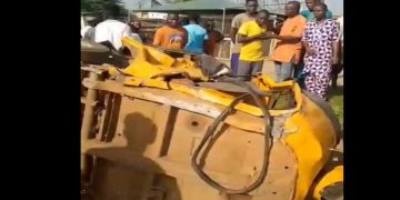 Scene of fatal accident at Powerline junction in Ikorodu showing crashed vehicles and emergency responders