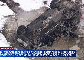 Driver Rescued After Plunging Into Icy Elgin Creek